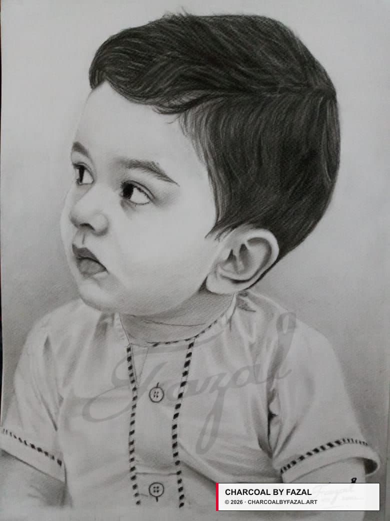 Child charcoal portrait by Fazal Abbas.